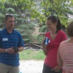 people talking at annual party on the island event at Esquire Estates Germantown Wisconsin